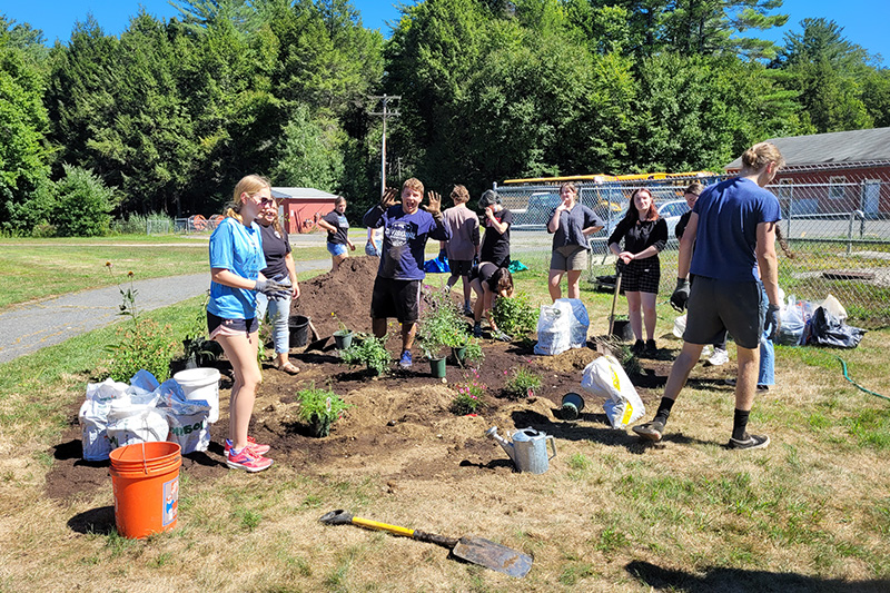 MTRS students finished planting plants in the pollinator garden